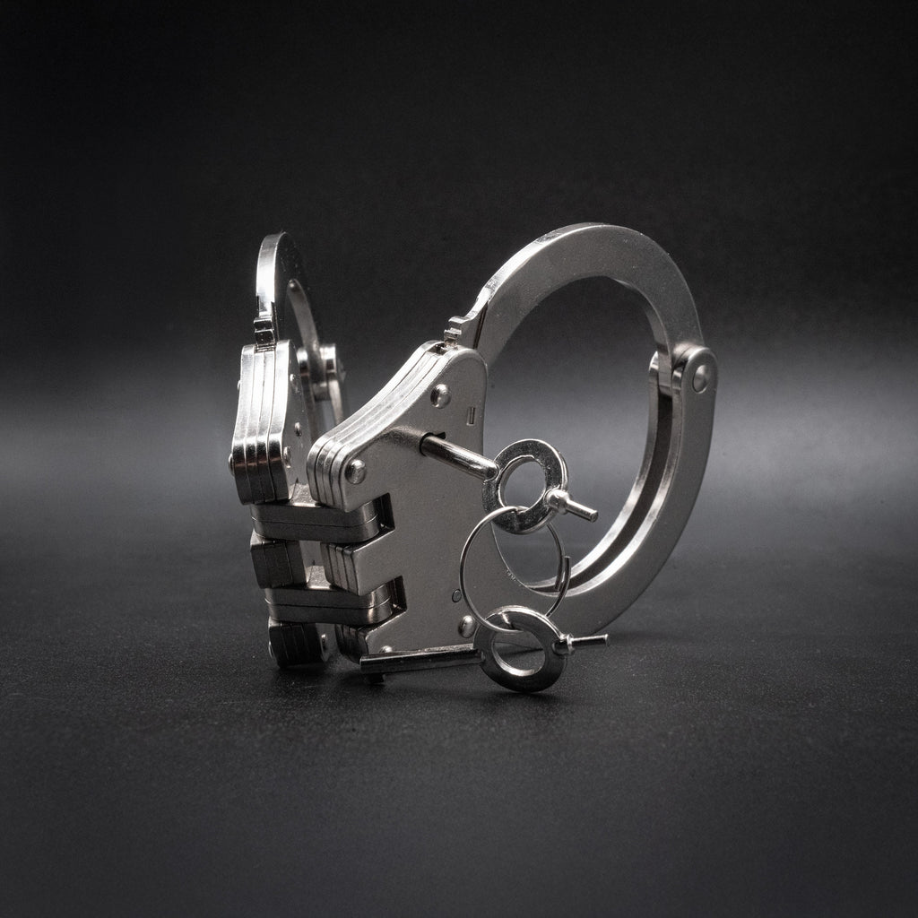 POLICE CUFFS STEEL HINGED