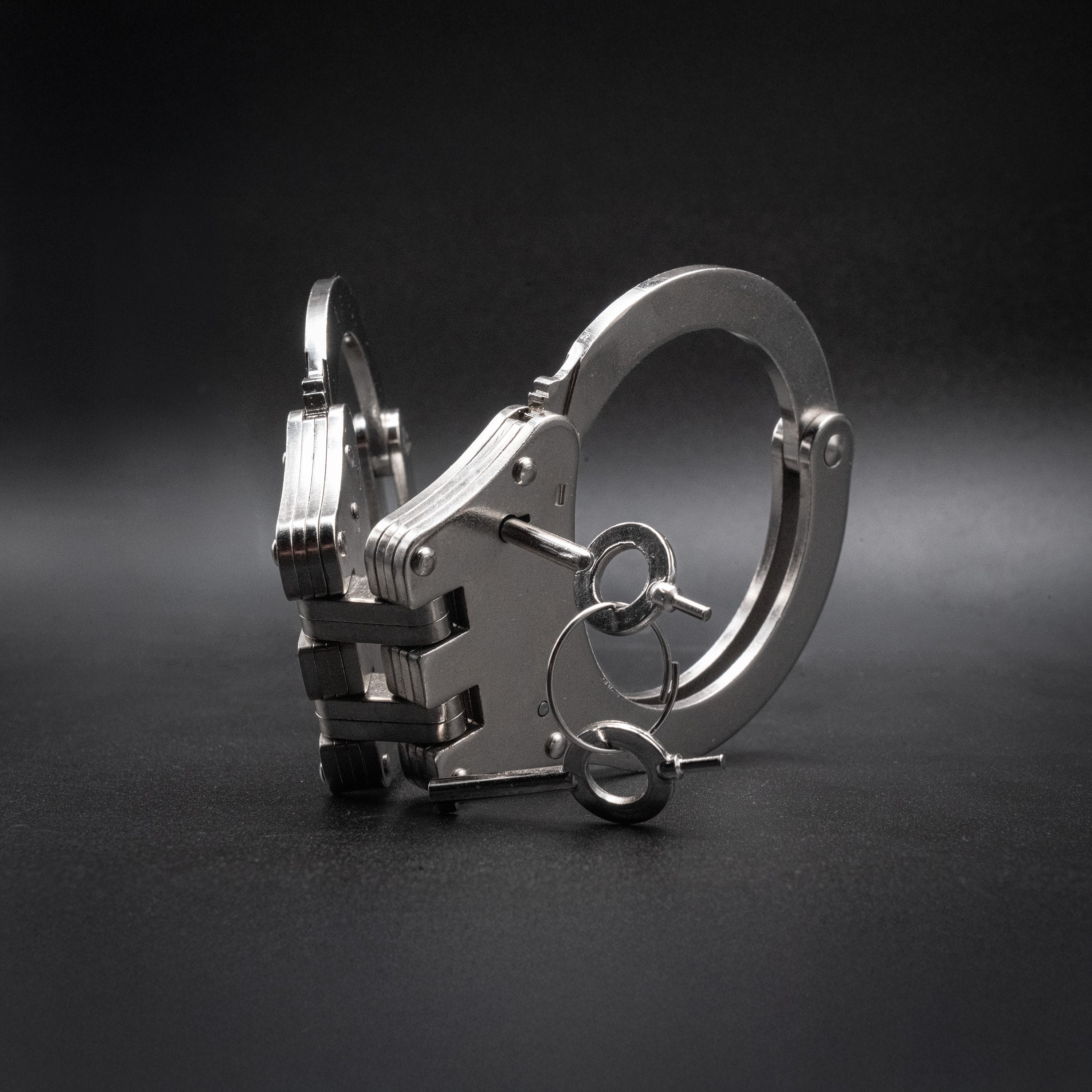 POLICE CUFFS STEEL HINGED