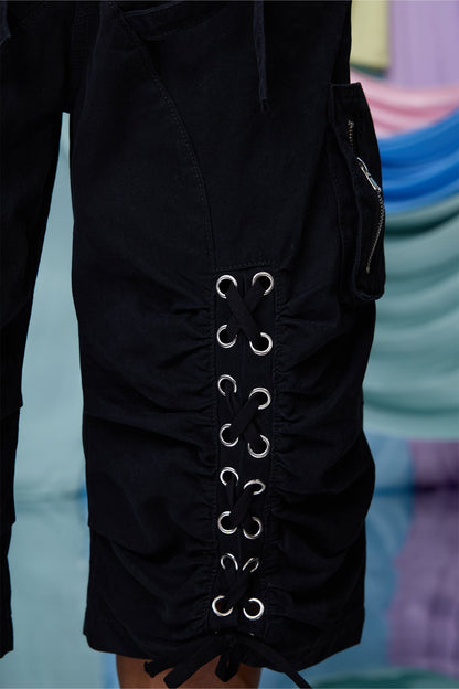 Raw Flare Lace Up Capri Pants Black